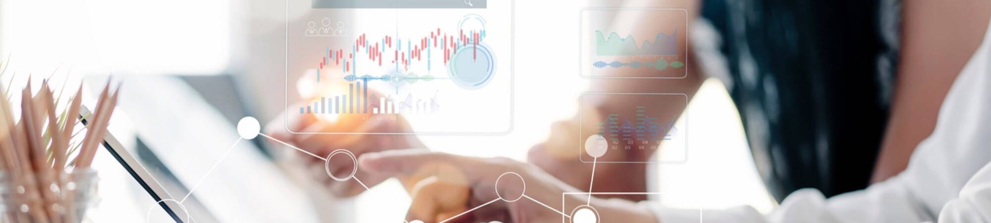 leads B2B sales charts working at desk